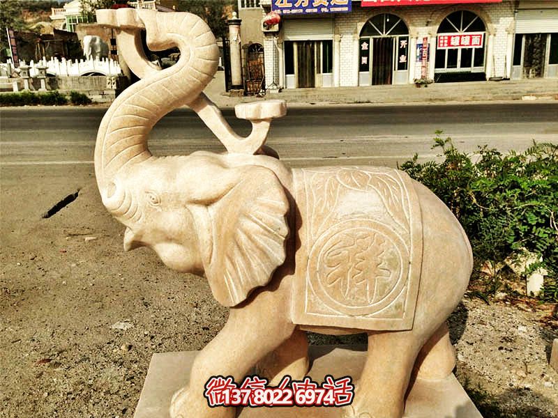 公園景區晚霞紅石雕大象雕塑